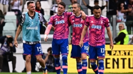Dusan Vlahovic celebrates with his Juventus team-mates after scoring against Lecce