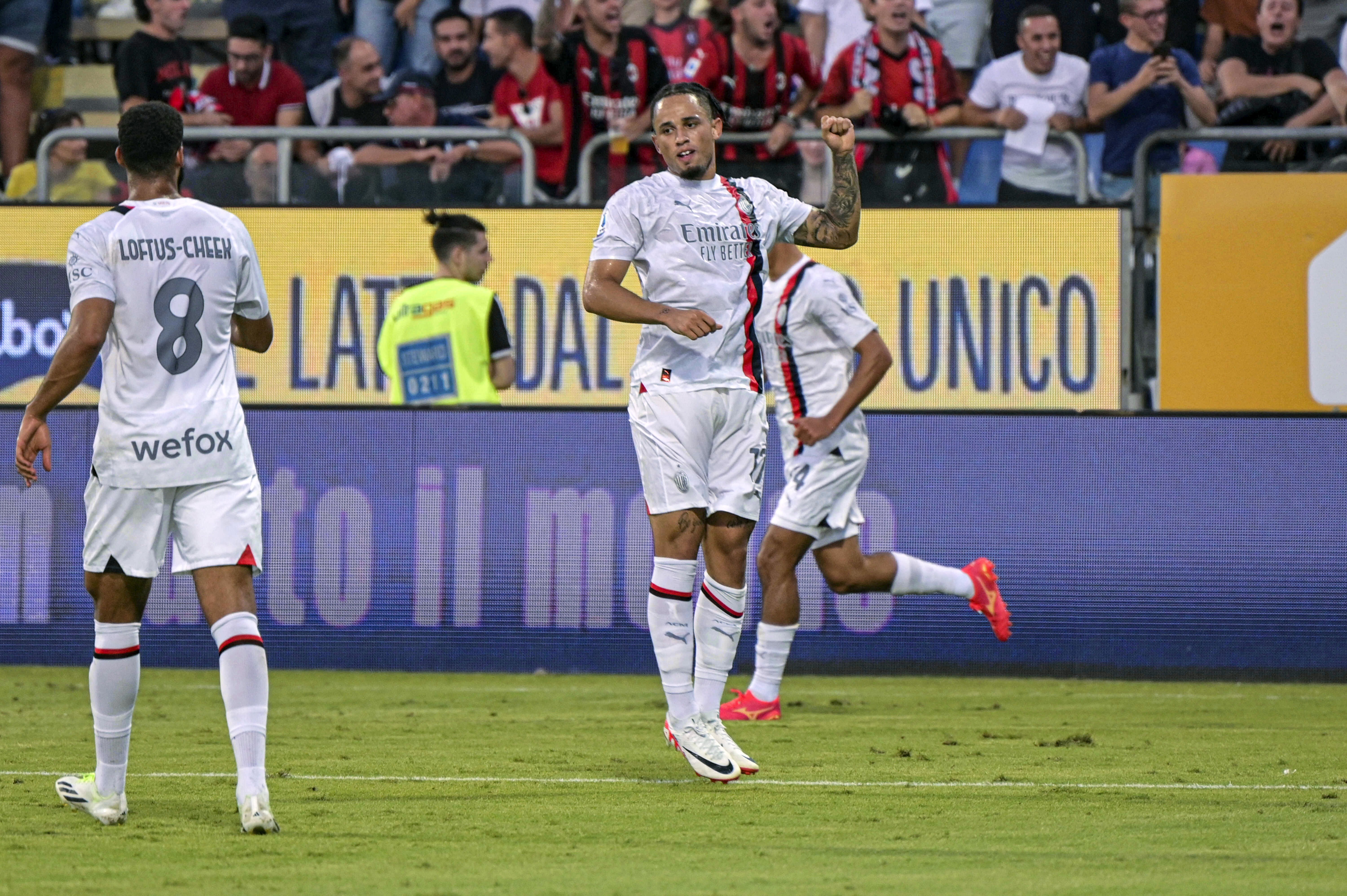 Noah Okafor celebrates Milan's equaliser