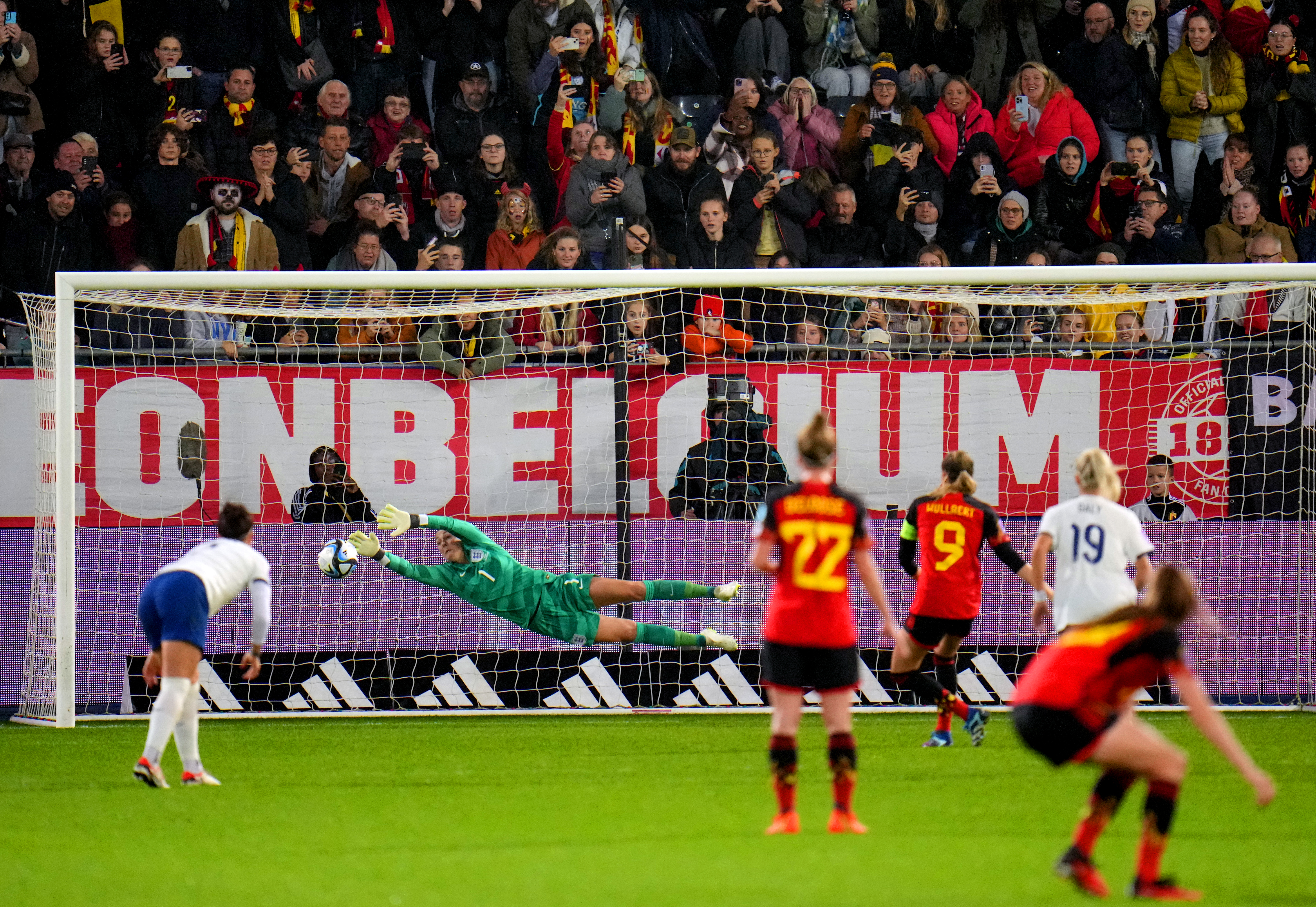 Tessa Wullaert, centre right, scores Belgium's winner from the penalty spot