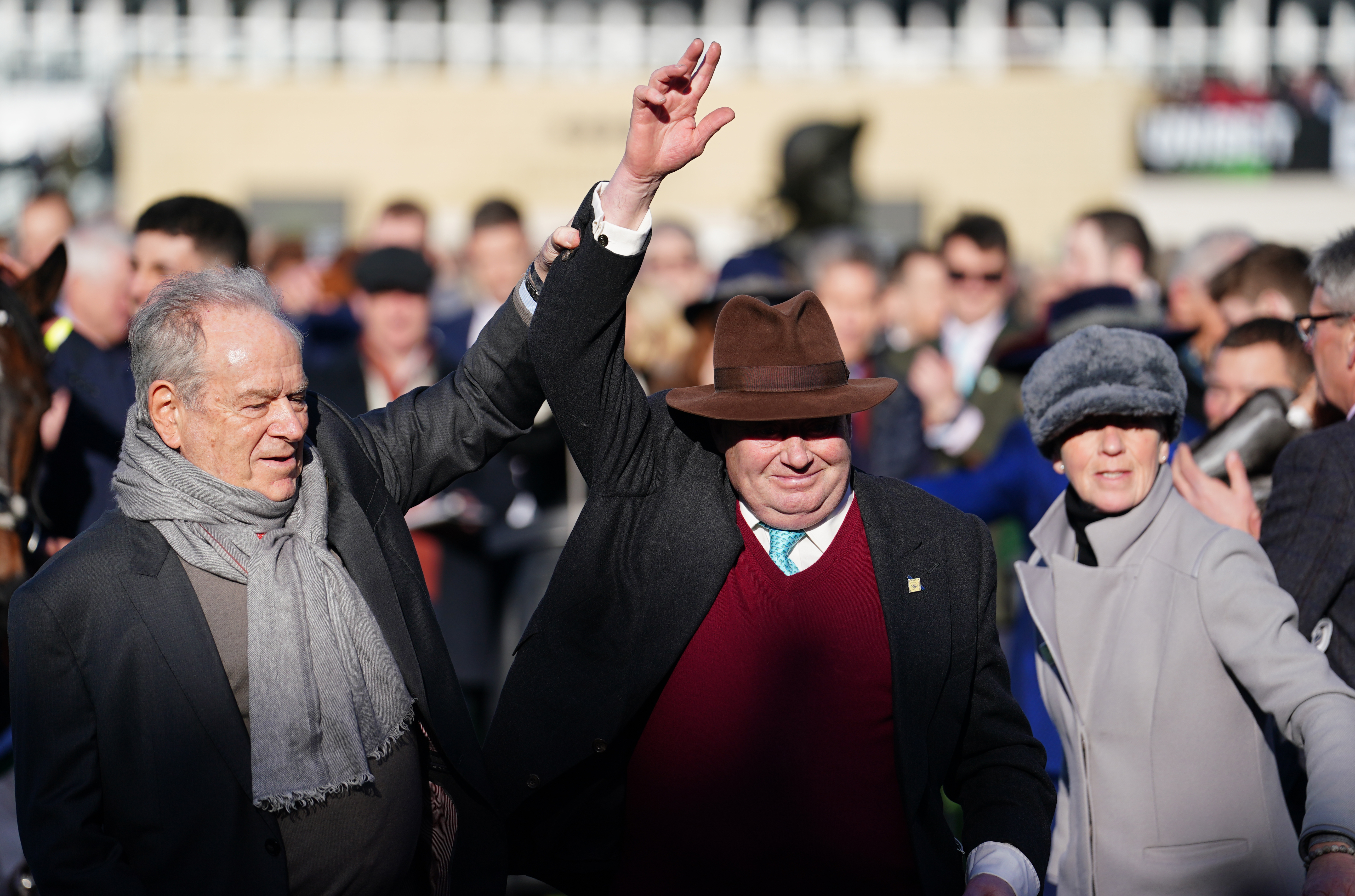 Nicky Henderson celebrates with owner Michael Buckley (left) at Cheltenham last year
