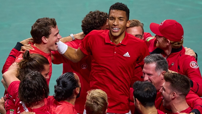 Felix Auger-Aliassime is mobbed after leading Canada to Davis Cup glory