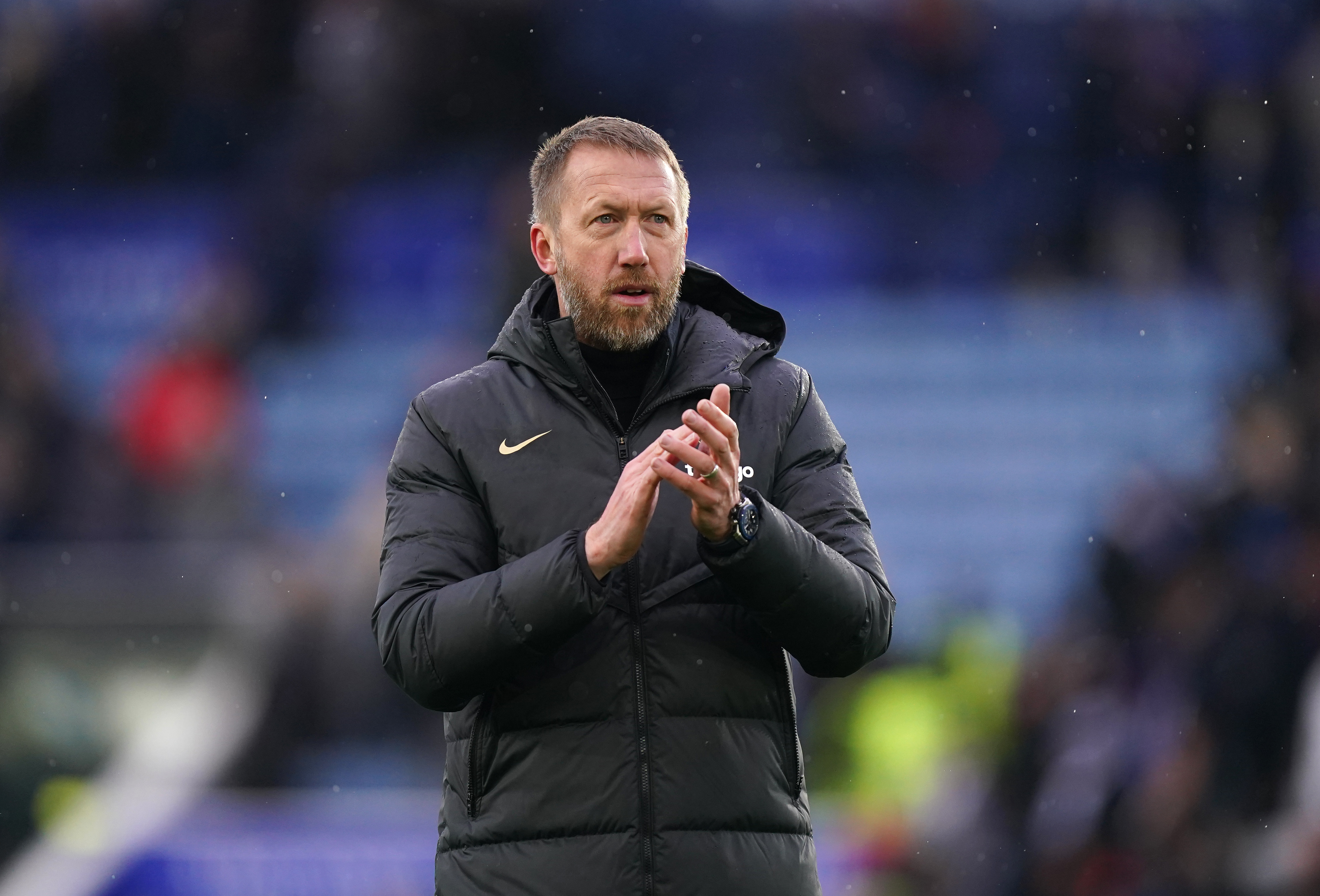 Graham Potter applauds the Chelsea fans after a win at Leicester