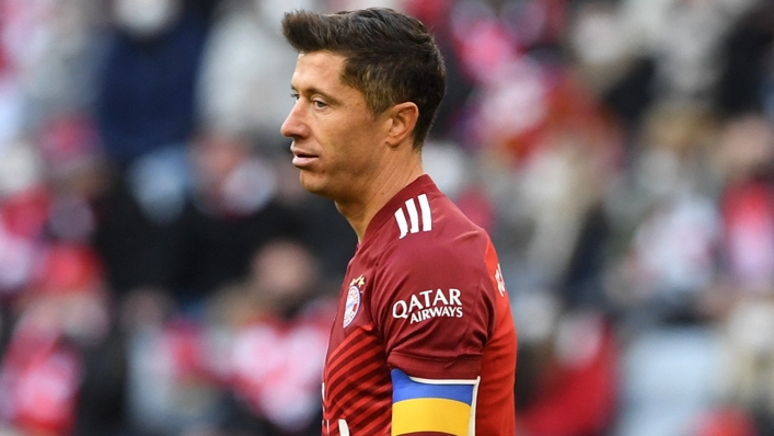 Bayern Munich striker Robert Lewandowski looks on frustrated.