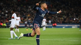 Paris Saint-Germain forward Kylian Mbappe celebrates scoring against Lorient