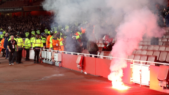 A flare was thrown as trouble followed PSV's game at Arsenal