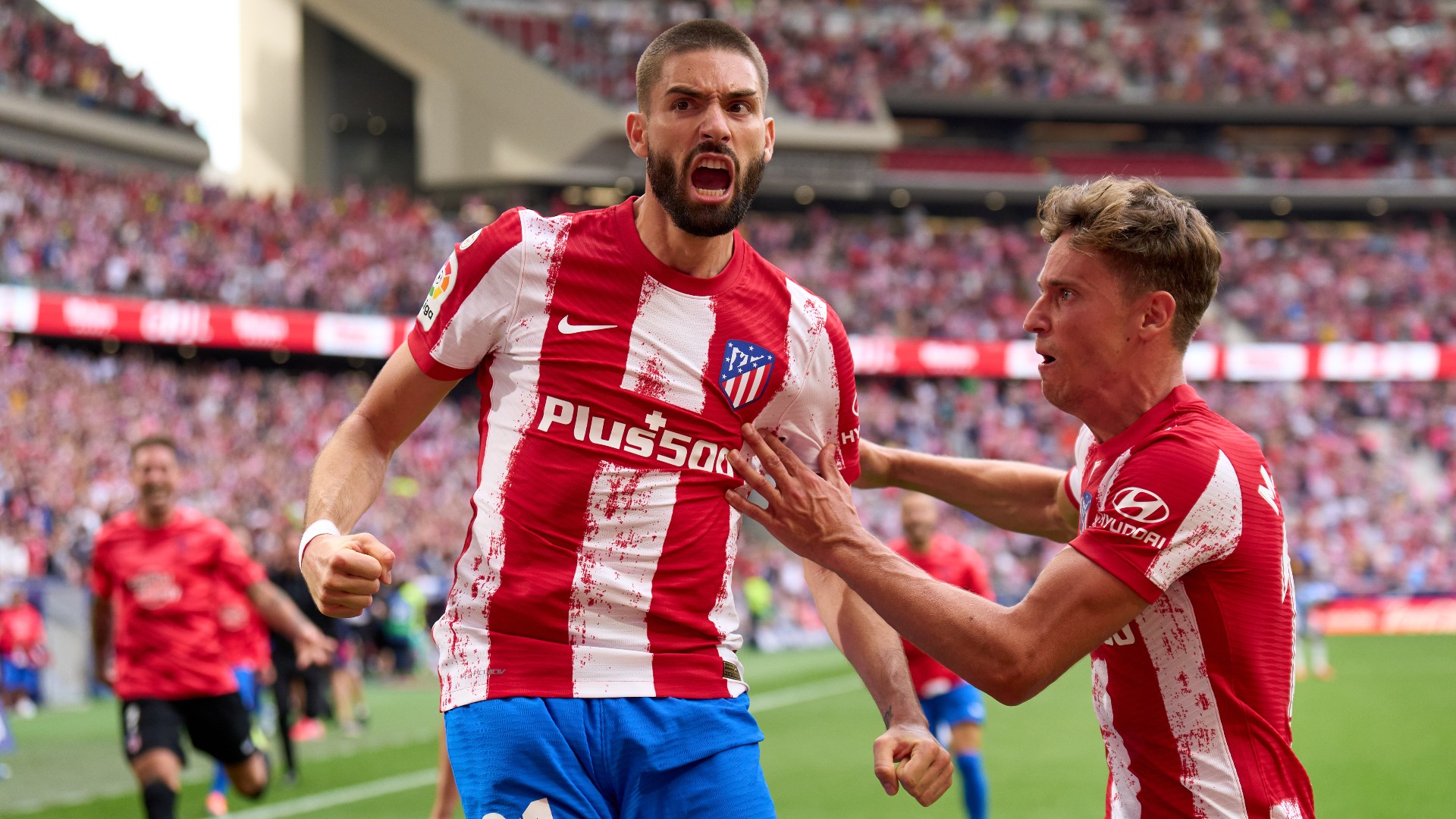 Yannick Carrasco celebrates after his penalty against Espanyol on Sunday