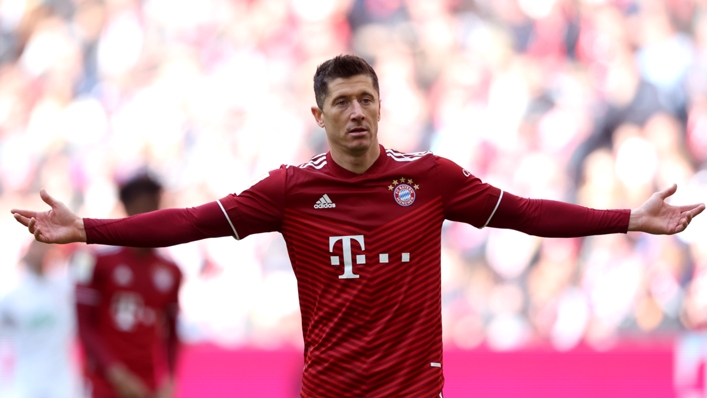 Robert Lewandowski celebrates scoring against Augsburg