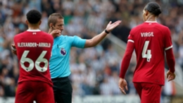 Liverpool captain Virgil van Dijk, right, has been charged with acting in an improper manner (Owen Humphreys/PA)