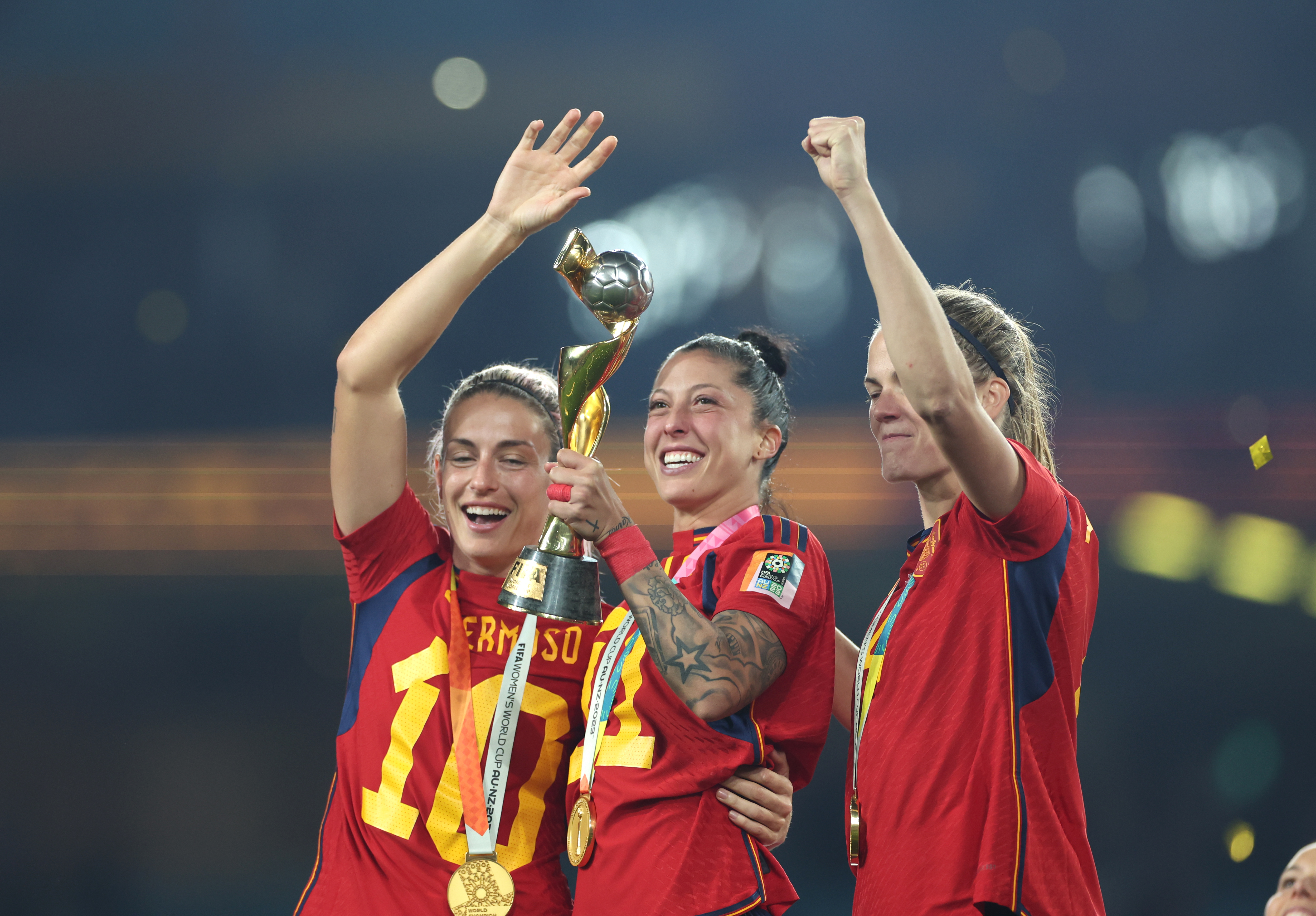 Jenni Hermoso (centre) celebrates Spain's World Cup win