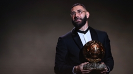 Karim Benzema holds the Ballon d'Or trophy