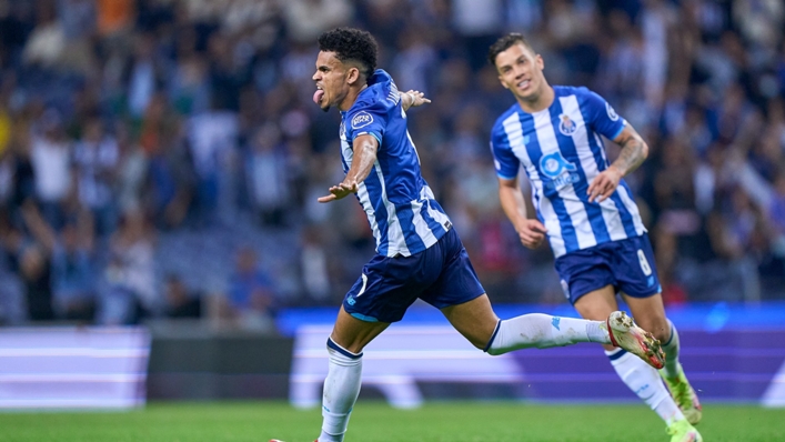 Luis Diaz wheels away in celebration after opening the scoring for Porto against Milan