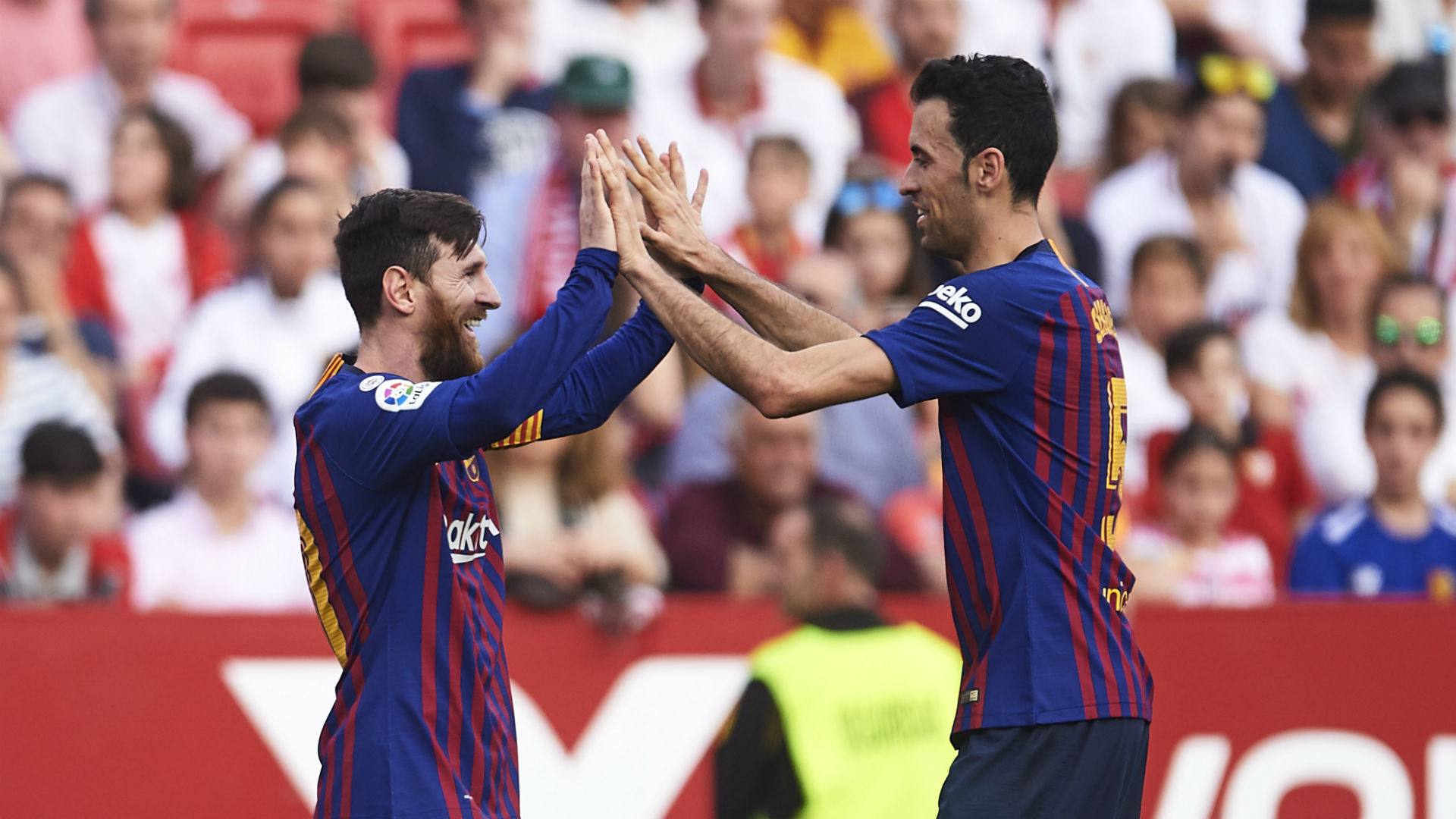LionelMessiSergioBusquets- cropped