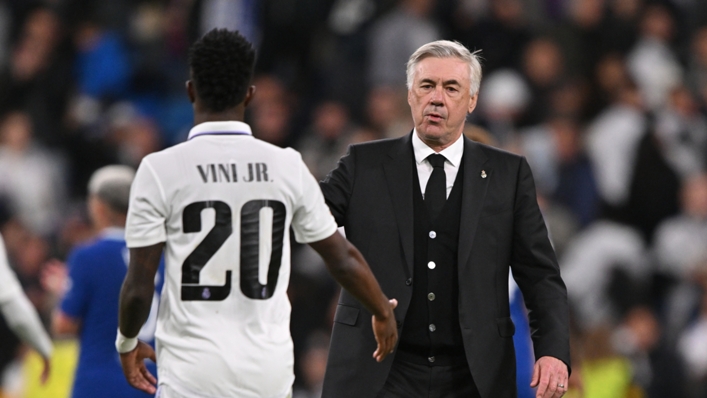 Vinicius Junior (L) and Carlo Ancelotti (R) after Real Madrid beat Chelsea at the Santiago Bernabeu