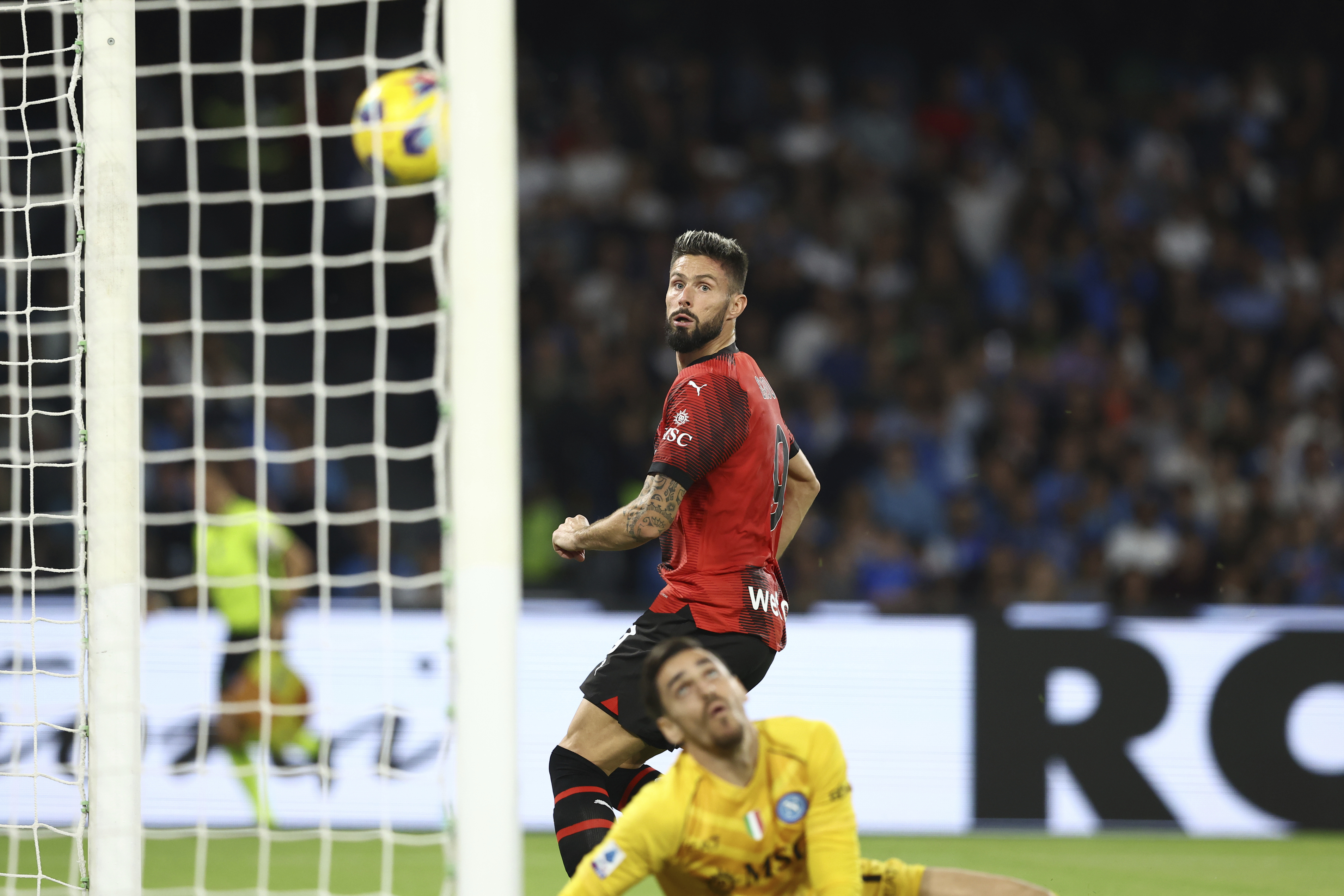 AC Milan striker Olivier Giroud scored two headers in the first half