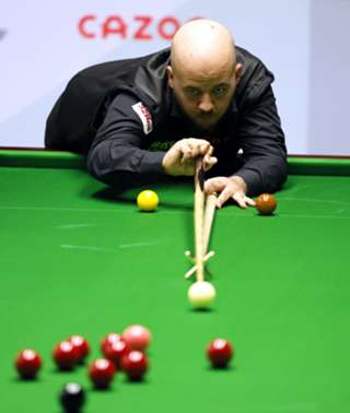 Luca Brecel finds form as World Championship title defence begins