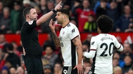 Aleksandar Mitrovic confronts referee Chris Kavanagh during Fulham’s FA Cup defeat at Manchester United in March (Martin Rickett/PA)