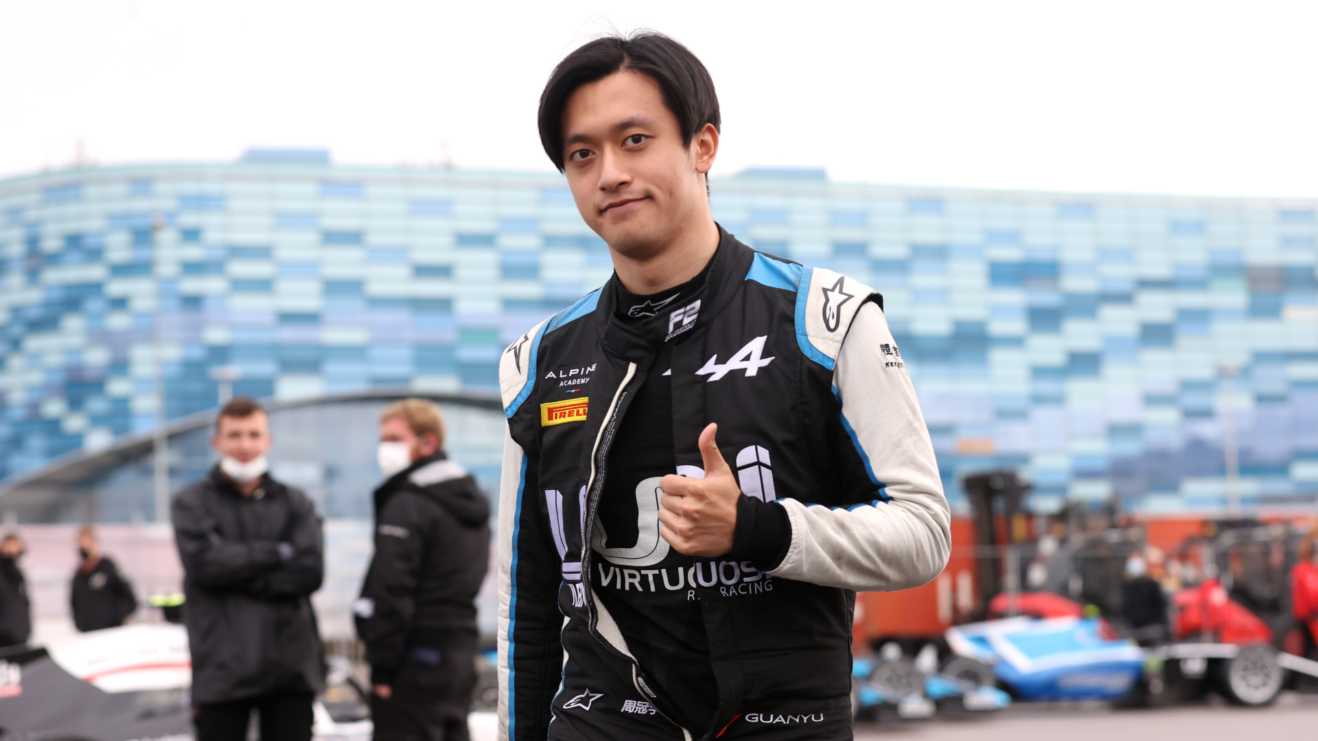 Guanyu Zhou prepares to drive in Sochi