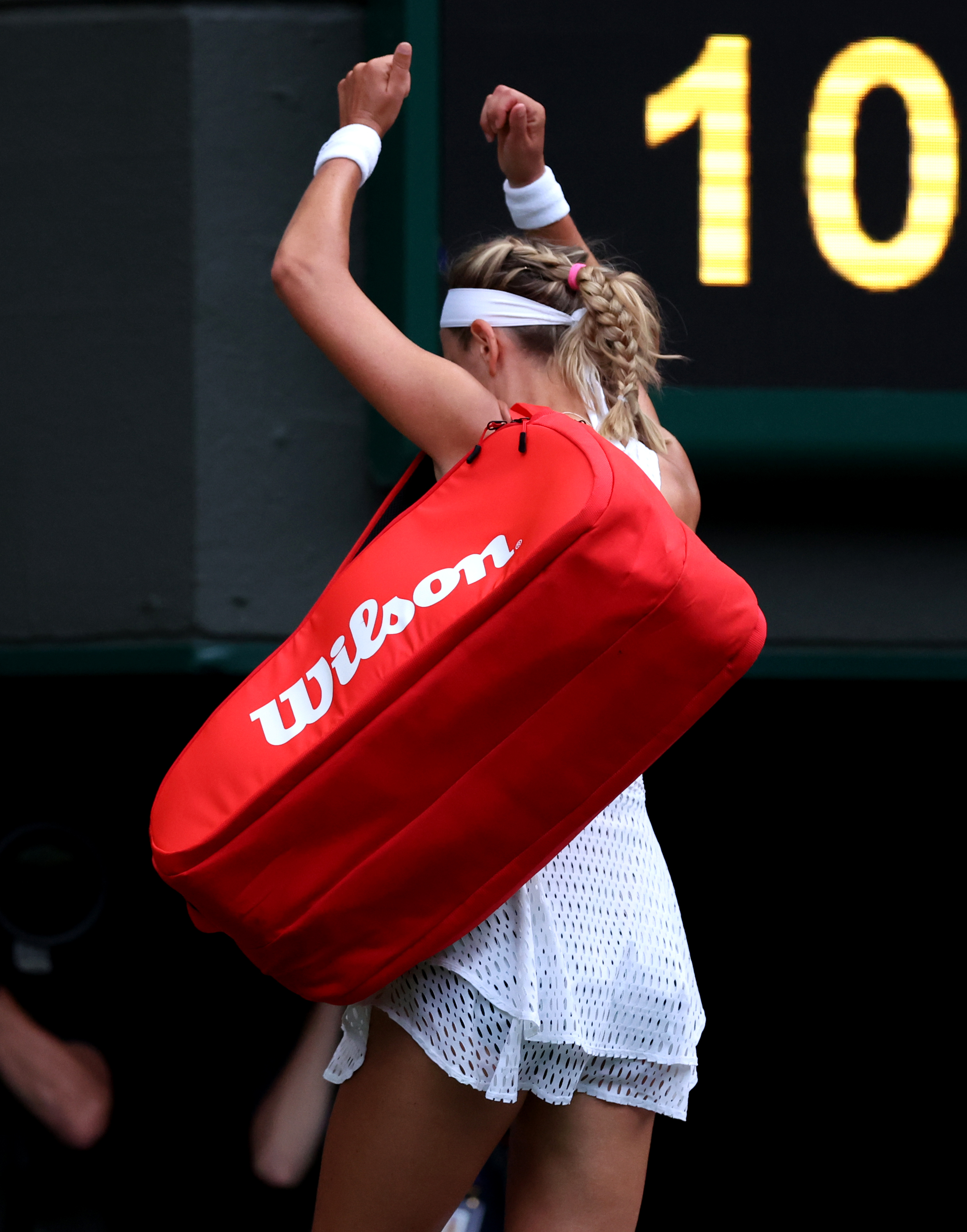 Victoria Azarenka reacts to being booed by the Centre Court crowd