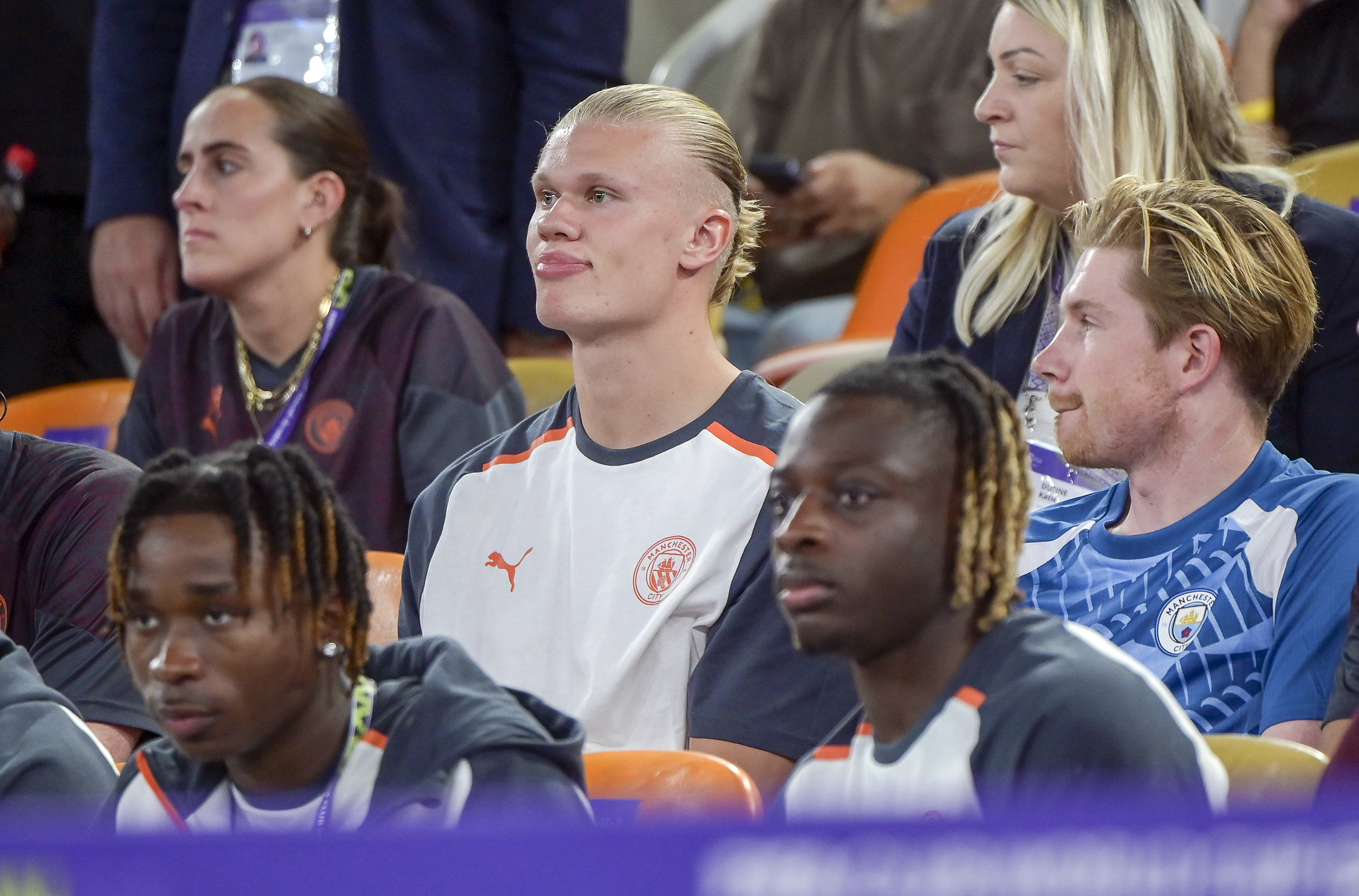Erling Haaland, centre, and Kevin De Bruyne, right