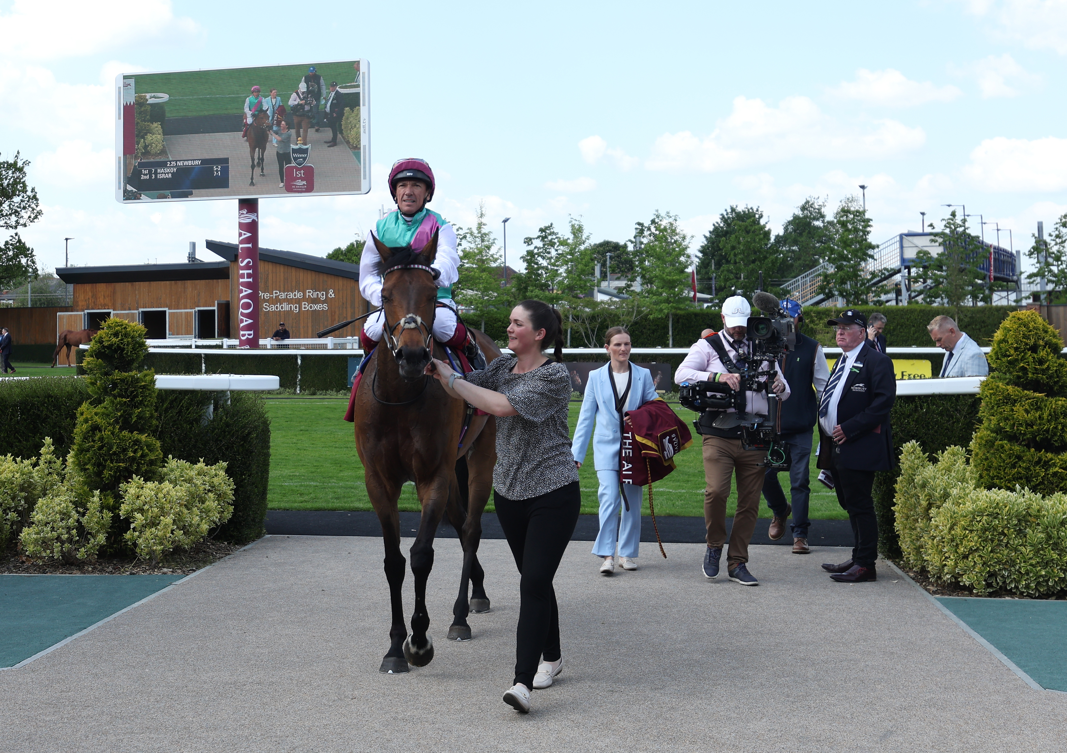 Haskoy returns to the winner's enclosure at Newbury