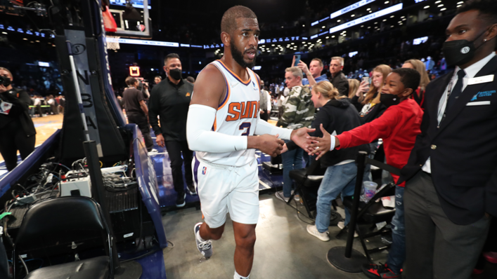 Chris Paul of the Phoenix Suns runs off the court after the game against the Brooklyn Nets
