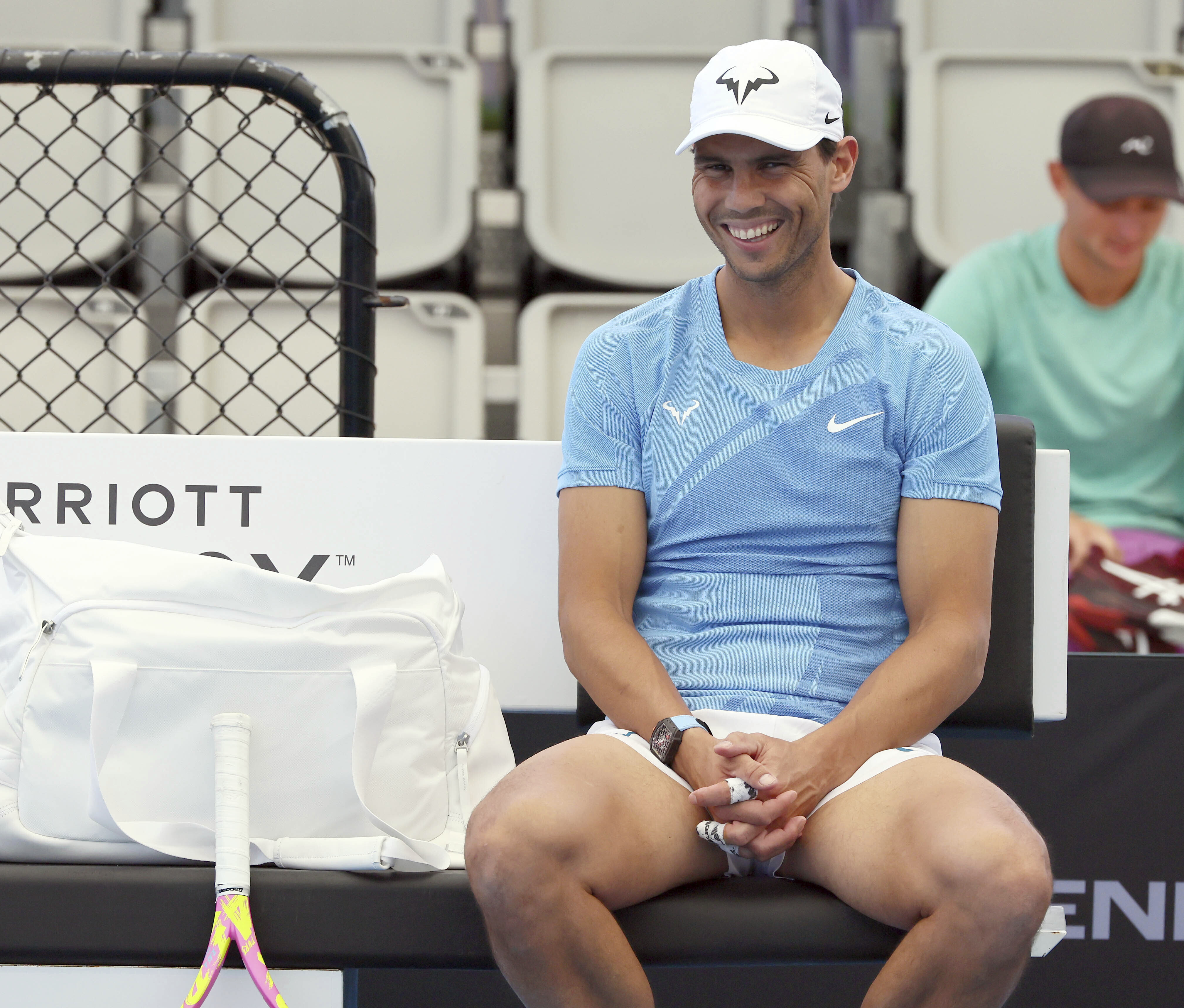 Rafael Nadal smiles during a training session