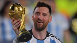 Lionel Messi lifts the World Cup trophy in front of a home Argentina crowd