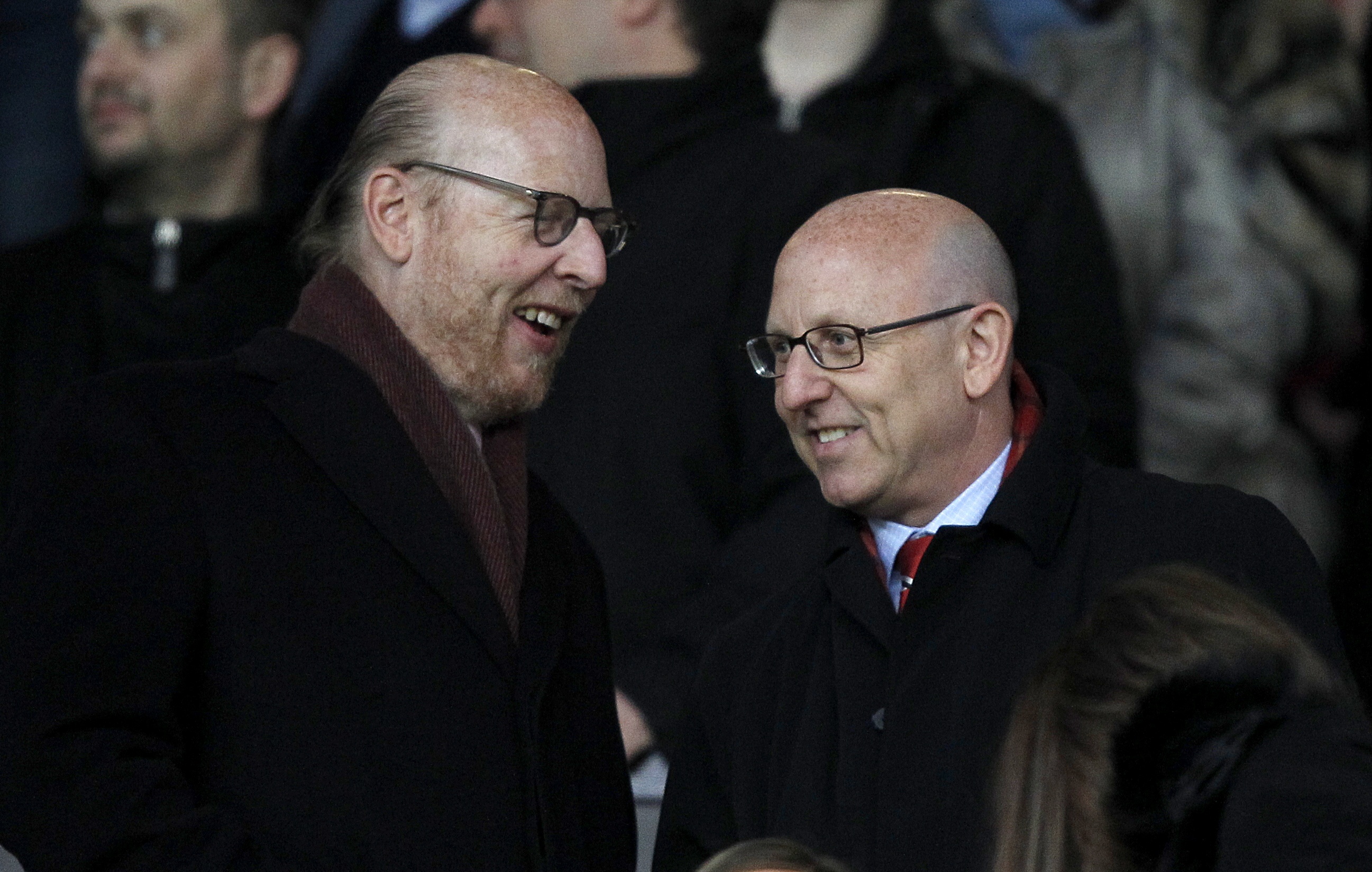Manchester United joint chairmen Joel Glazer, right, and Avram Glazer, left