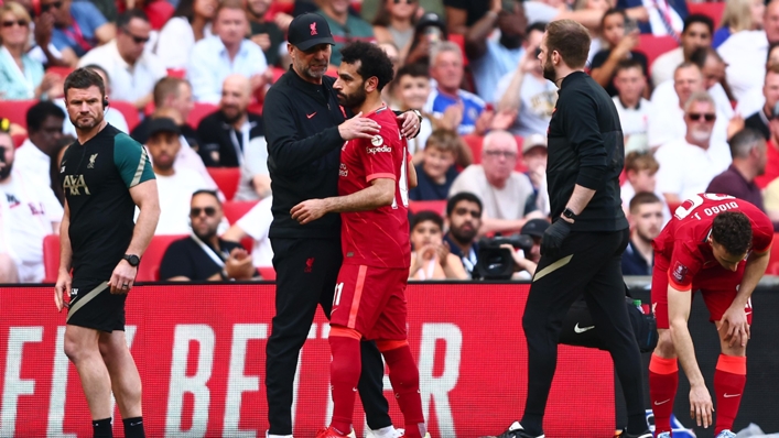 Mohamed Salah embraces Jurgen Klopp after being substituted against Chelsea