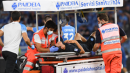 Hirving Lozano of Napoli leaves the pitch with an injury