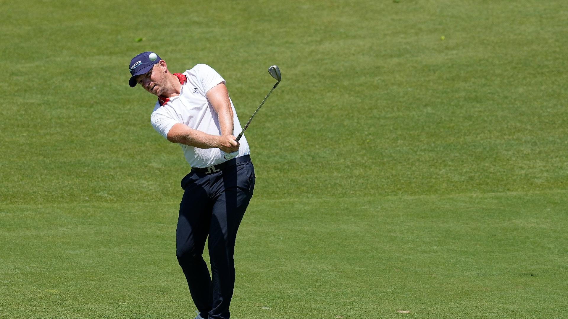 Matt Wallace hits to the 18th green during the first round of the Memorial golf tournament