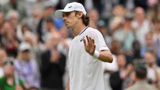 Wimbledon: Djokovic through to semis after injured De Minaur withdraws