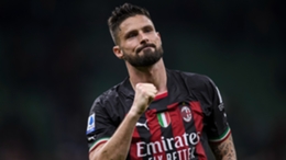 Olivier Giroud celebrates after netting with a fine header in Turin