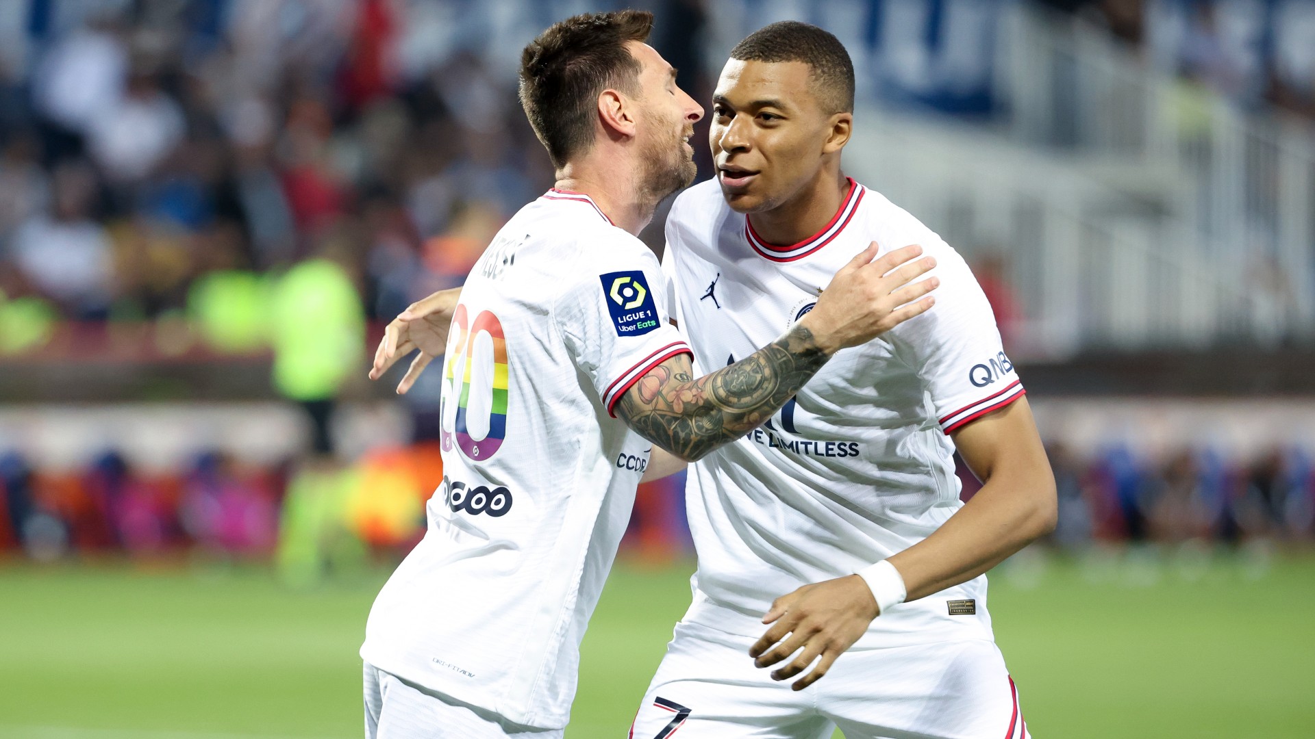 Kylian Mbappe with Barcelona great Lionel Messi at PSG