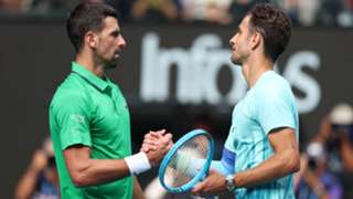 Australian Open: Djokovic bailed out by Musetti injury to reach semi-finals