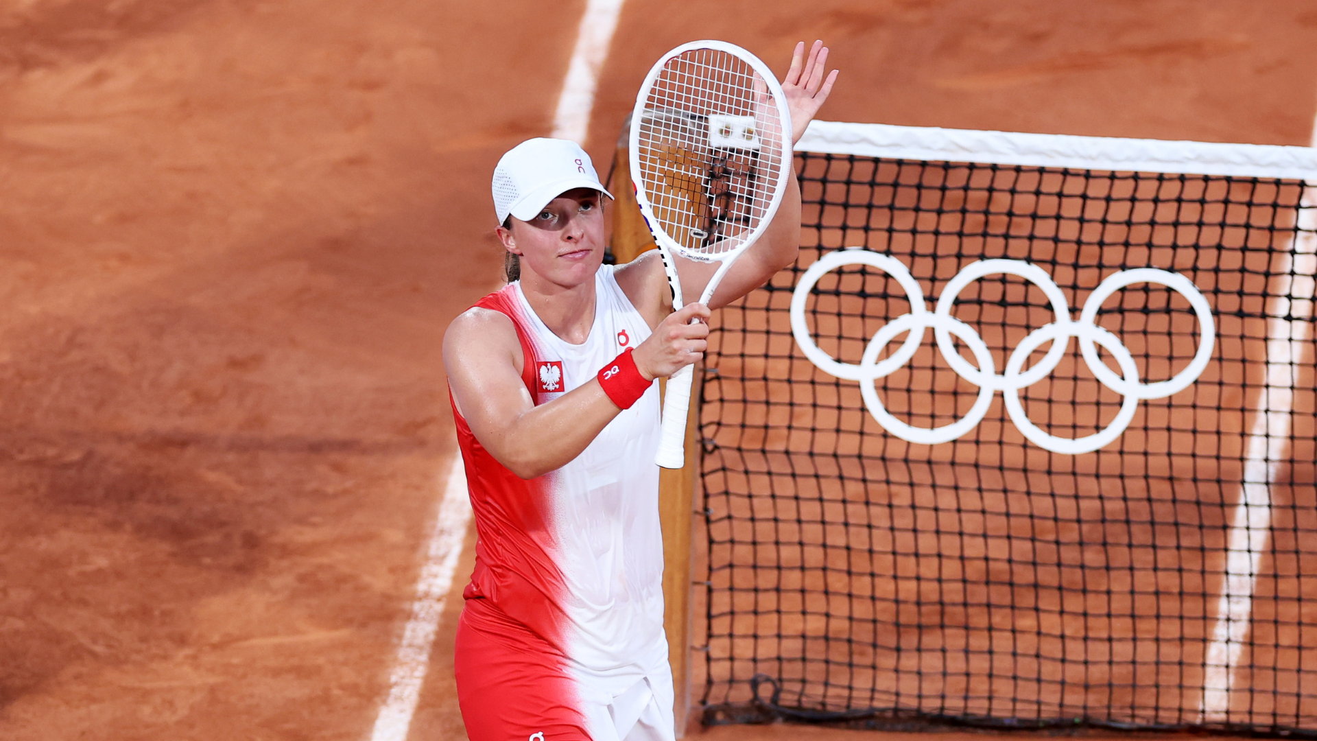 Swiatek eases to Paris Olympics quarter-finals