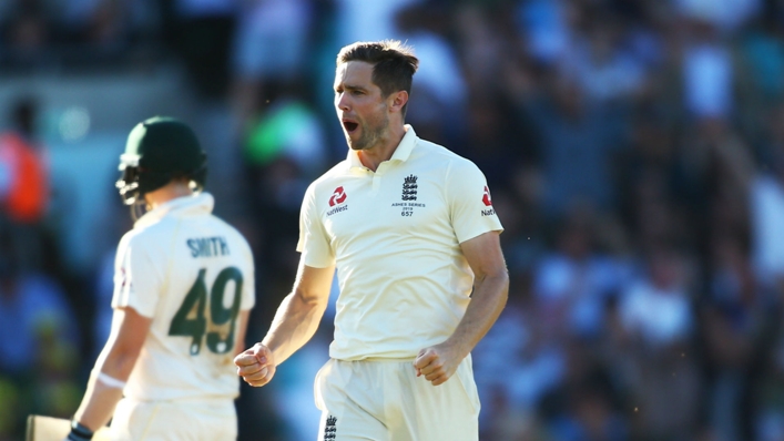 England seamer Chris Woakes celebrates dismissing Steve Smith at The Oval