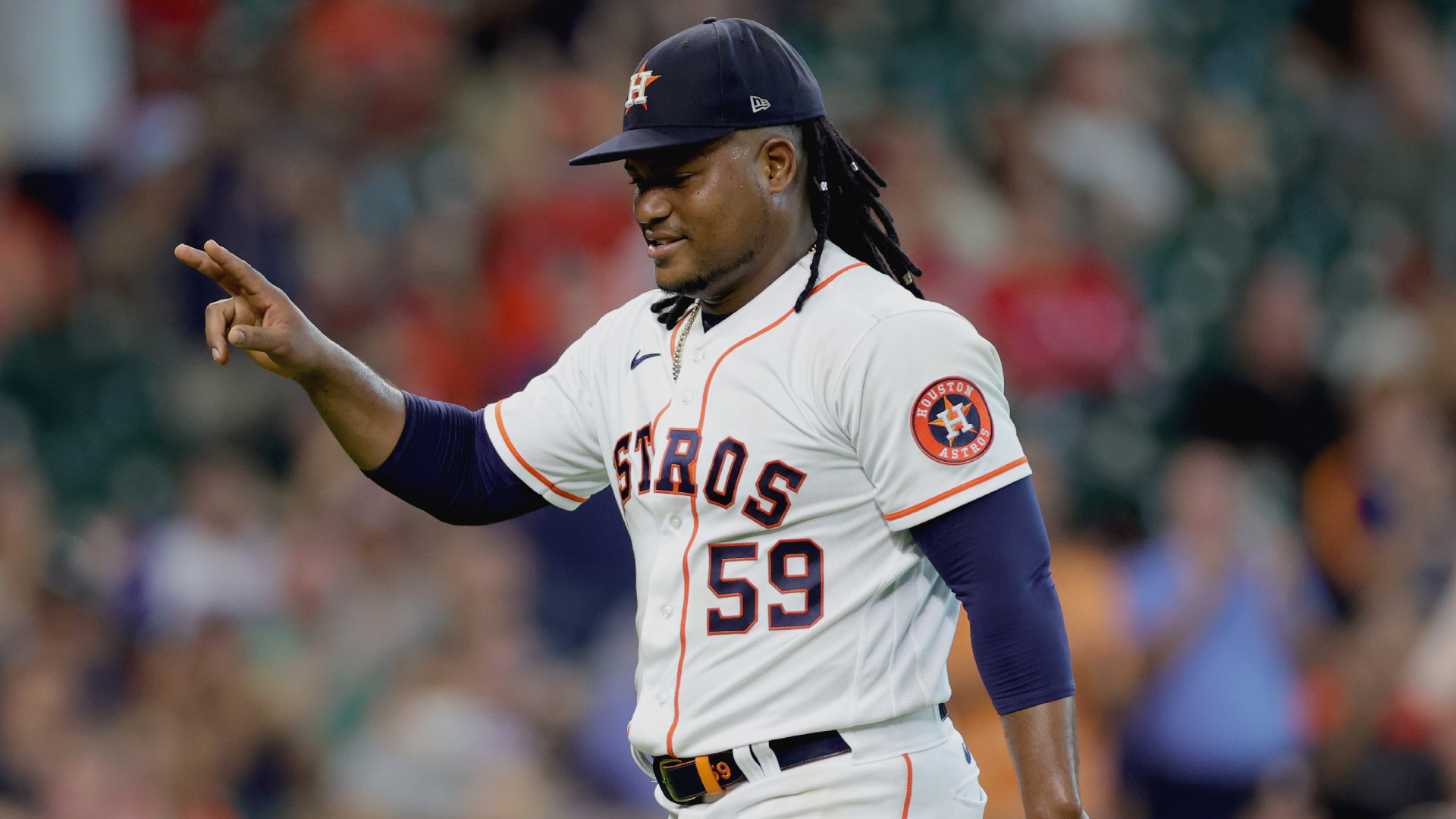 Framber Valdez of the Houston Astros reacts to striking out Bubba Thompson of the Texas Rangers to get out of the seventh inning at Minute Maid Park