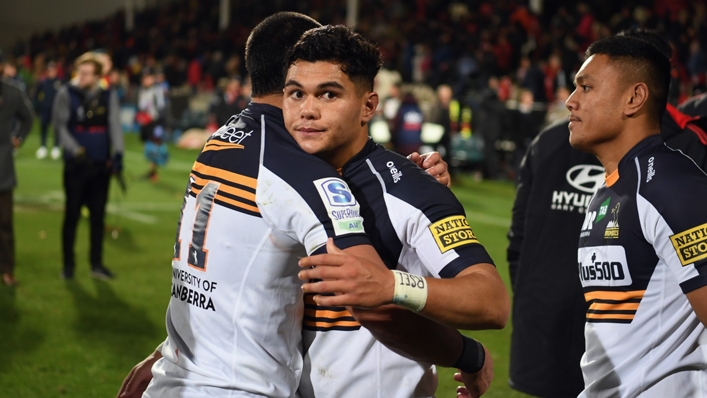 The Brumbies fly-half Noah Lolesio is consoled after missing a last-minute kick against the Crusaders in Super Rugby