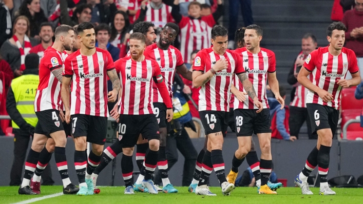 Athletic Bilbao players celebrate after Mario Hermoso's own goal for Atletico Madrid