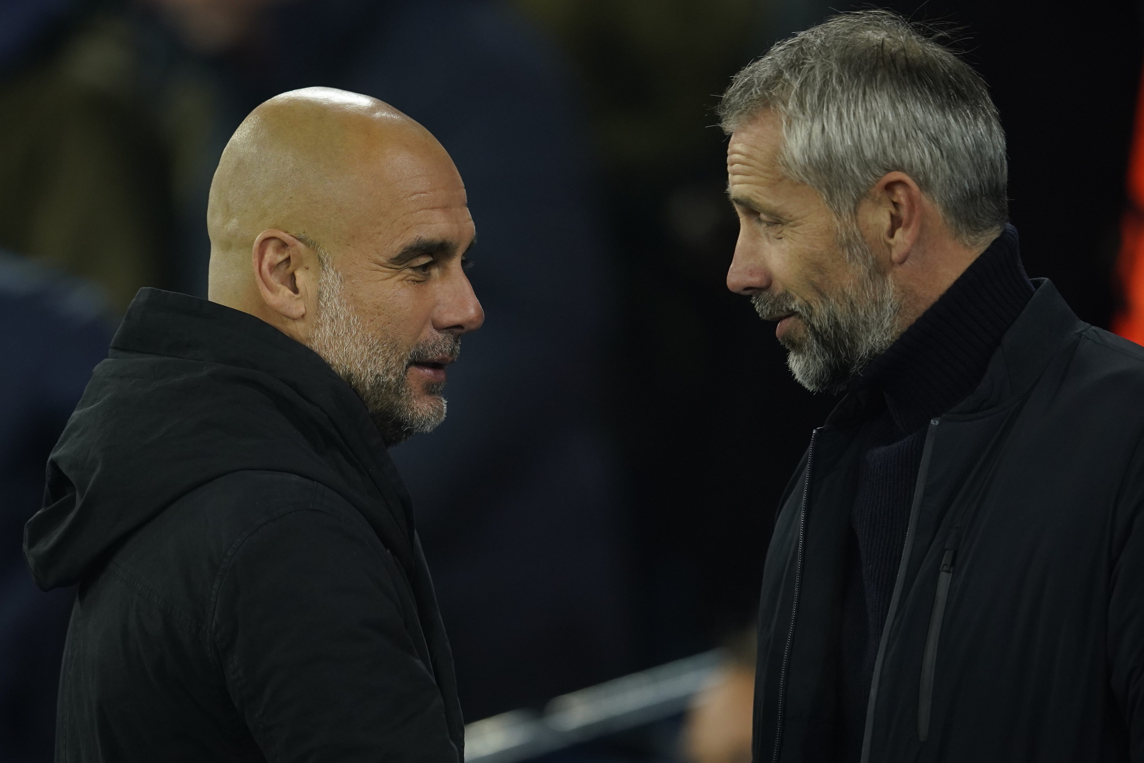 Marco Rose, right, greets Pep Guardiola pre-match