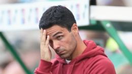 Mikel Arteta takes in the action at Hibernian