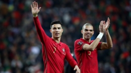 Pepe and Cristiano Ronaldo celebrate Portugal's qualification