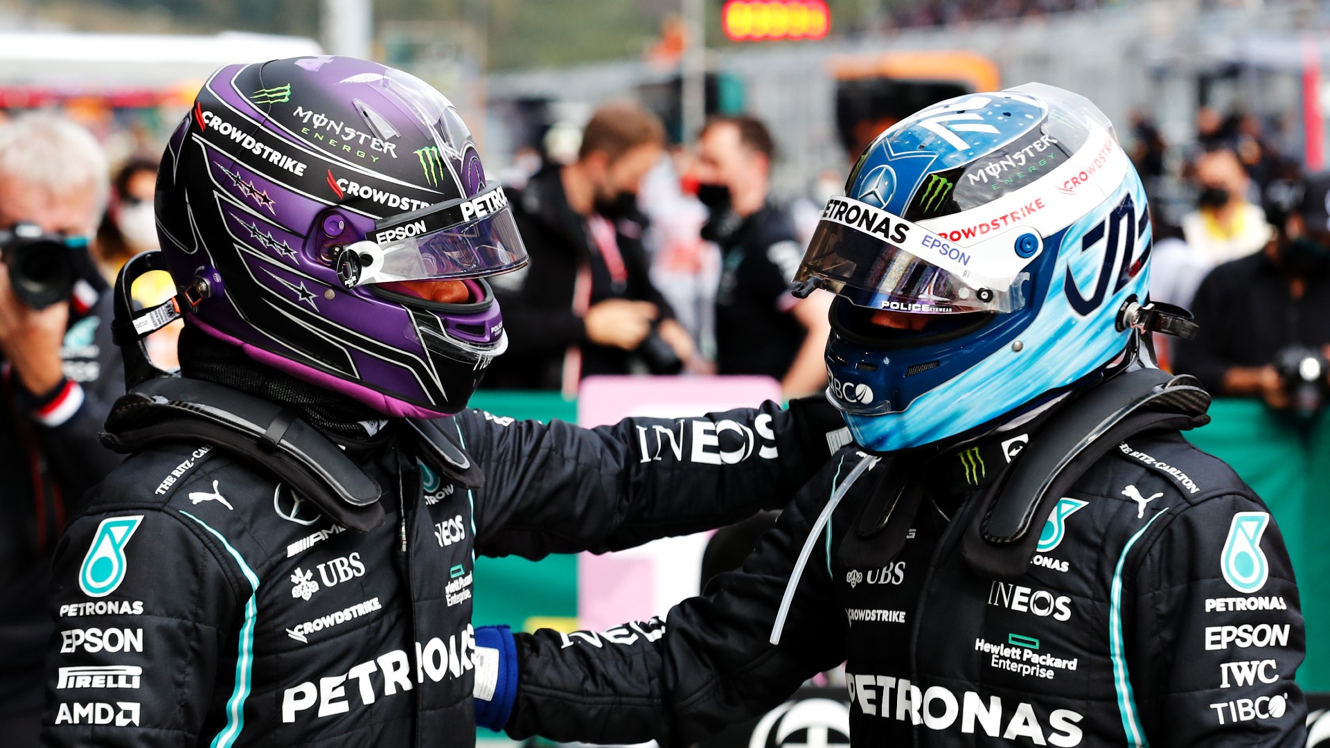 Mercedes team-mates Lewis Hamilton (L) and Valtteri Bottas (R)