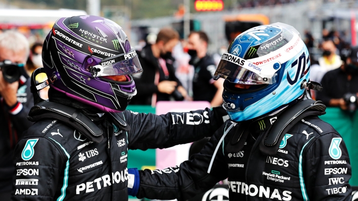 Mercedes team-mates Lewis Hamilton (L) and Valtteri Bottas (R)