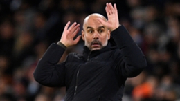 Pep Guardiola reacts during Manchester City's win against Arsenal