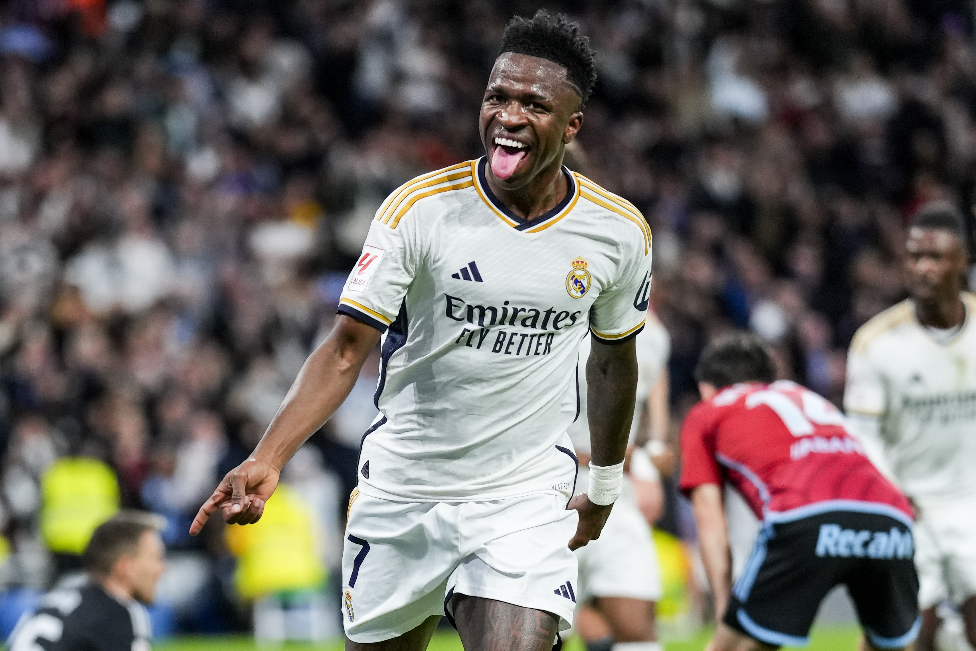Vinicius Junior celebrates after giving Real Madrid a first-half lead
