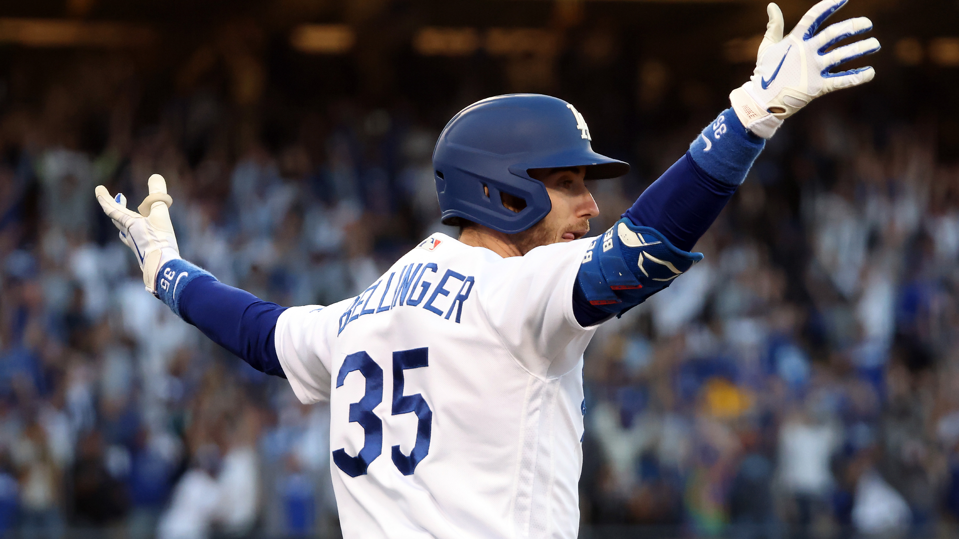 Cody Bellinger #35 of the Los Angeles Dodgers reacts as he hits a 3-run home run during the 8th inning of Game 3 of the National League Championship Series against the Atlanta Braves