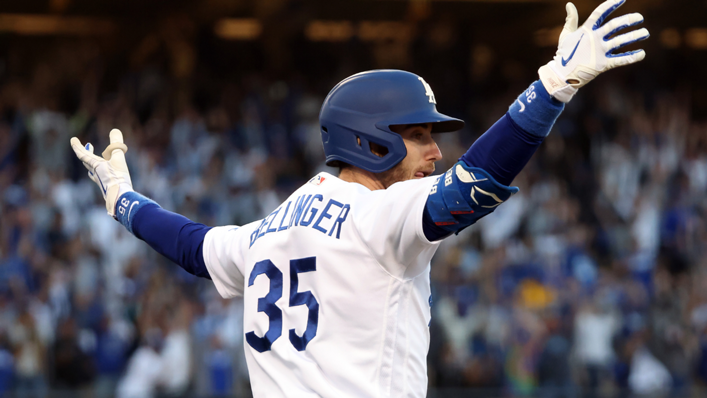 Cody Bellinger #35 of the Los Angeles Dodgers reacts as he hits a 3-run home run during the 8th inning of Game 3 of the National League Championship Series against the Atlanta Braves