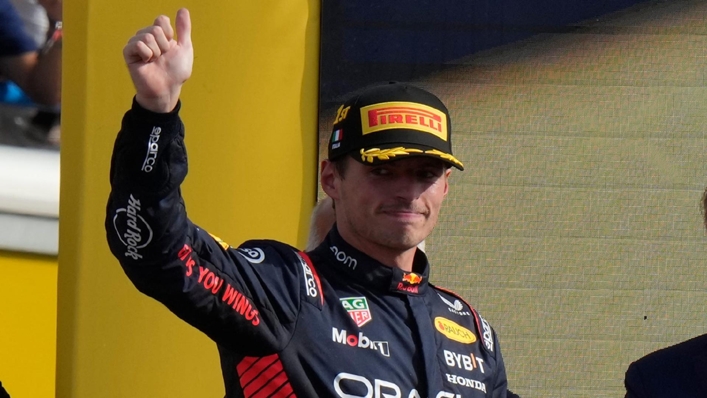 Red Bull driver Max Verstappen of the Netherlands celebrates on the podium after winning the Formula One Italian Grand Prix auto race, at the Monza racetrack (AP Photo/Luca Bruno)
